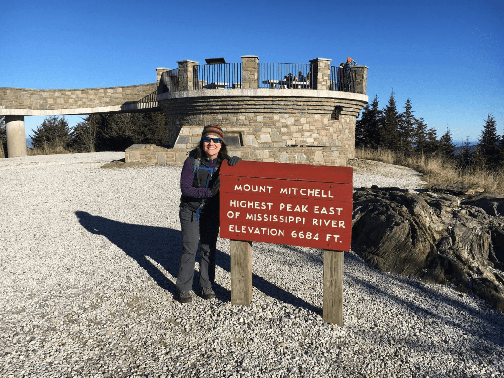 Sign and observatory at the top of Mount Mitchell. "Mount Mitchell. Highest Peak East of Mississippi River. Elevation 6684 feet."