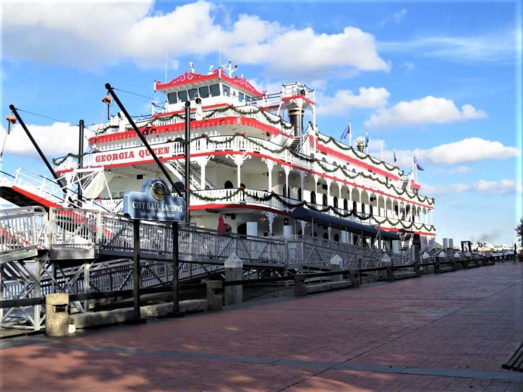 Red and white Georgia Queen riverboat anchored in Savannah.