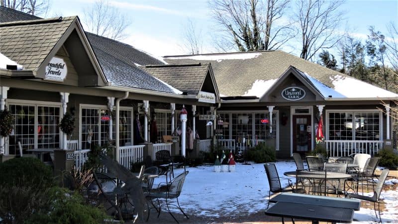 Small grey shopping center tucked away in Blowing Rock.