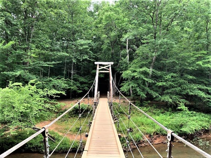 The suspension bridge at Eno River is long and narrow and can be scary.