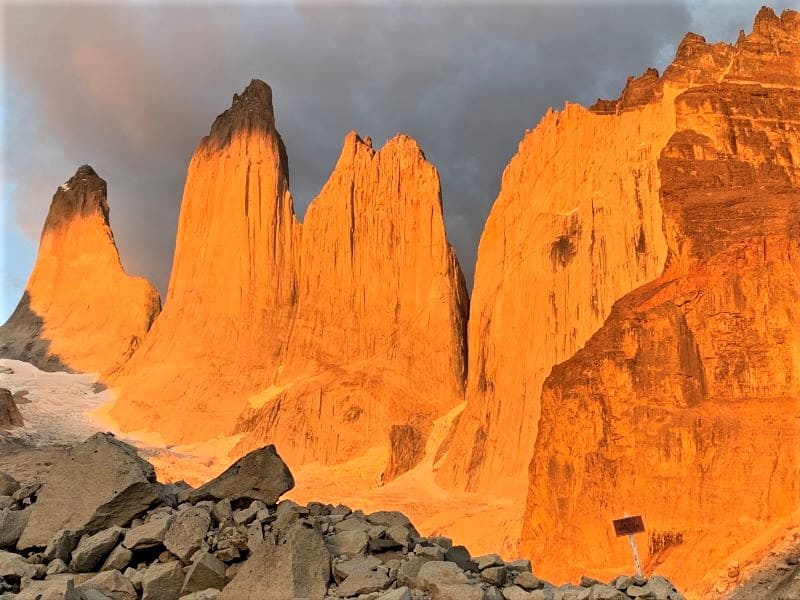 The Towers at Torres del Paine 10 minutes past sunrise look bronze and orange.