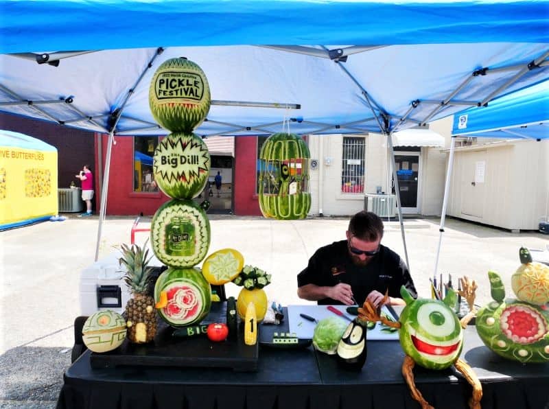 The Fruit Ninja carving his next creation.