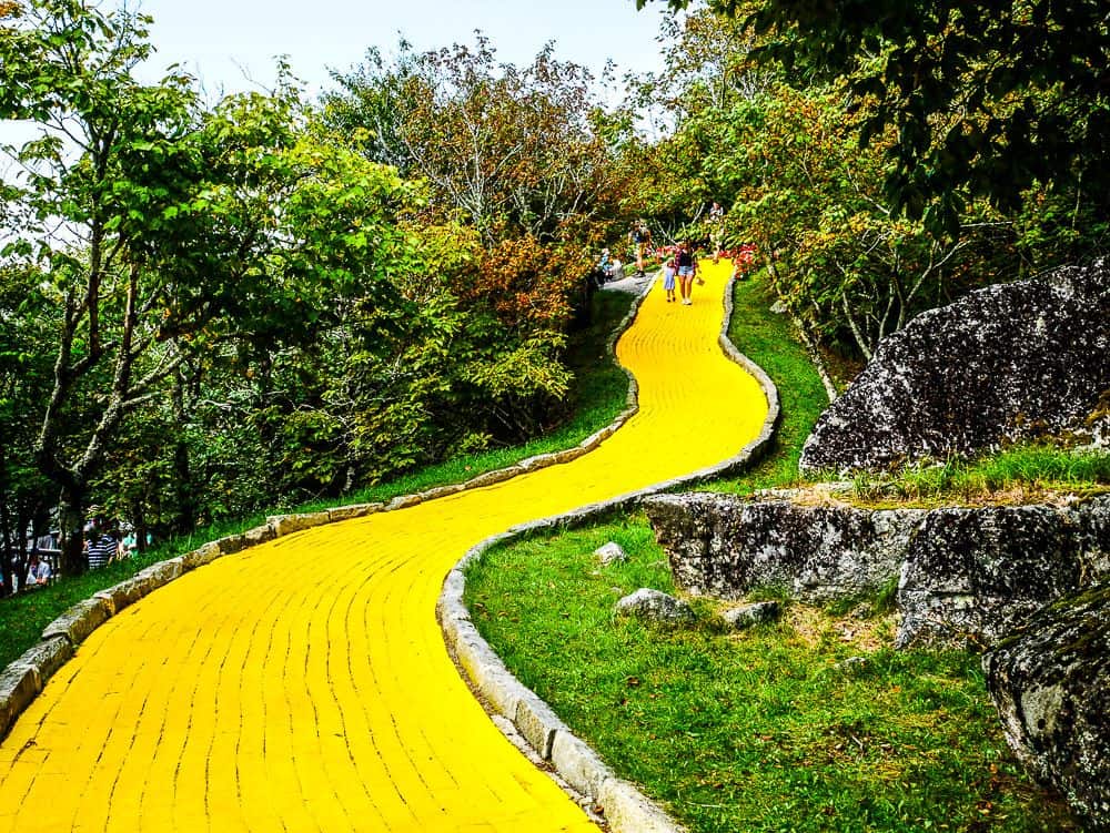 A view of the yellow brick road heading up a hill.