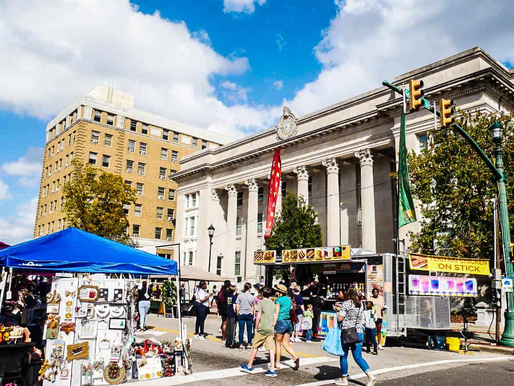 Crowds along street in front of City Hall at Whirligig Festival in Wilson